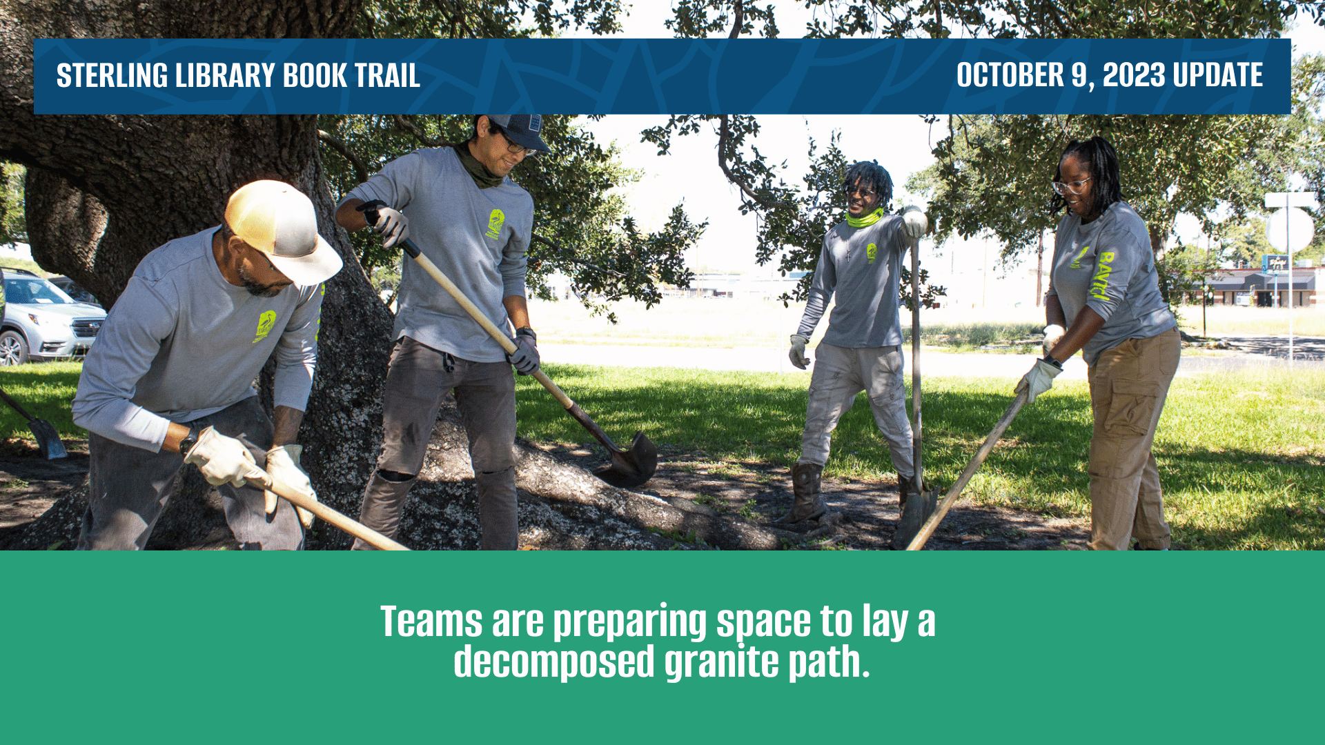 Parks workers with shovels clearing a path